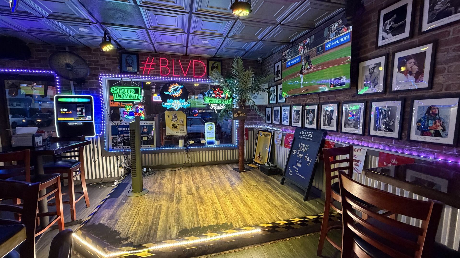 The live music stage lit with LED strips at The Boulevard in Boynton Beach
