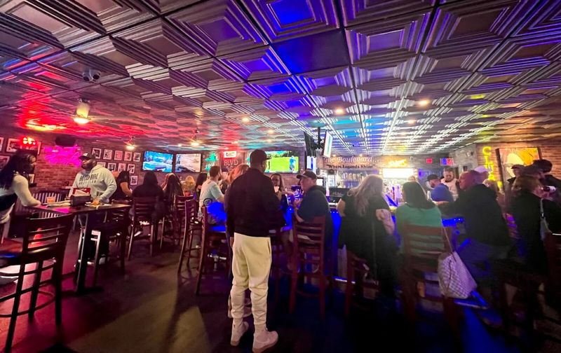 Crowd watching the game on big screens at The Boulevard sports bar, Boynton Beach