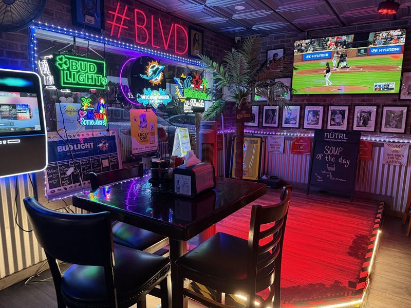 The #BLVD neon wall inside The Boulevard Bar & Grill, Boynton Beach