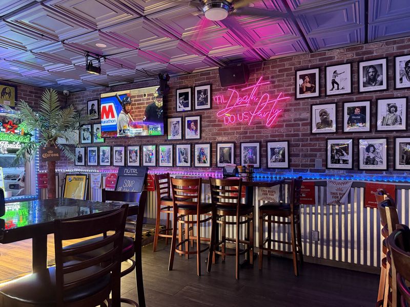 The Legends wall and 'Til Death Do Us Party neon sign