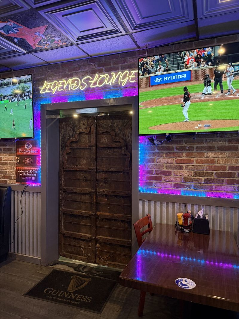 Legends Lounge entrance with neon sign